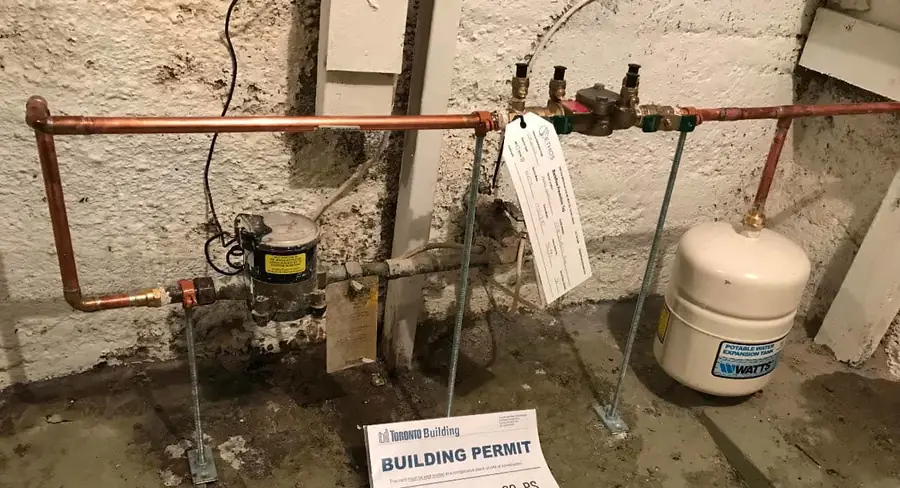 Backflow prevention device installed in a commercial building