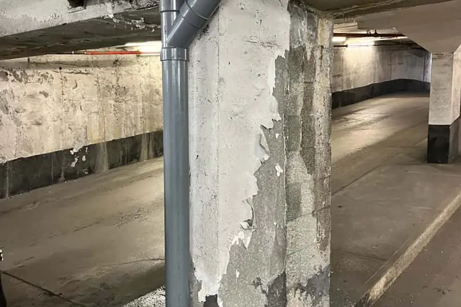 Plumber clearing a commercial drain